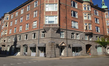Streetview of brown and grey office building