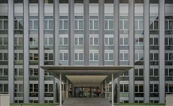 Front side of office building with a lot of windows