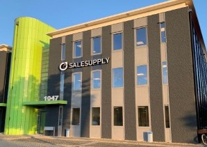 Front side of grey Salesupply office building